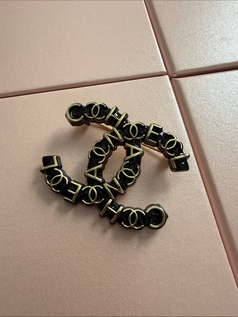 Black and Gold Logo Chain-Link Brooch